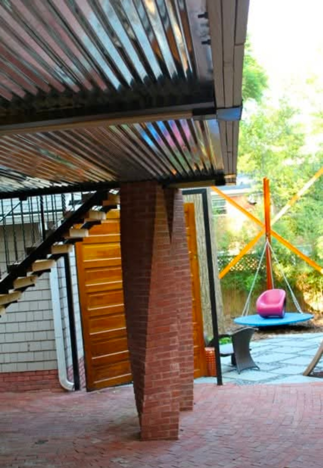 Custom pergola and brick patio outdoor living space construction